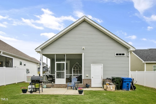 3501 Cranberry Ridge Dr SW, Wilson, NC 27893 - rear view of property featuring a patio area and a sunroom