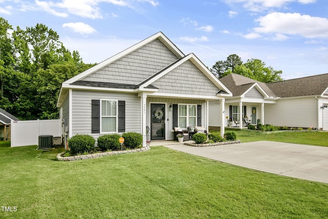 3501 Cranberry Ridge Dr SW, Wilson, NC 27893 - view of front of house with a porch, central air condition unit, and board and batten siding