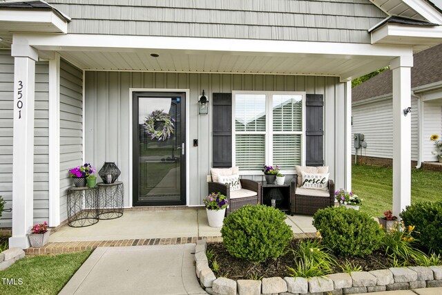 3501 Cranberry Ridge Dr SW, Wilson, NC 27893 - property entrance with covered porch and board and batten siding