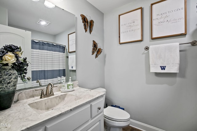 3501 Cranberry Ridge Dr SW, Wilson, NC 27893 - bathroom featuring vanity, toilet, and a shower with curtain