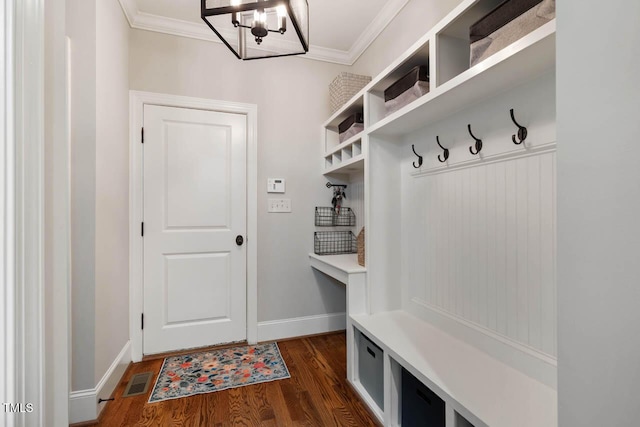 201 Margaret Mann Way, Pittsboro, NC 27312 - mudroom with ornamental molding, dark wood finished floors, baseboards, and a chandelier