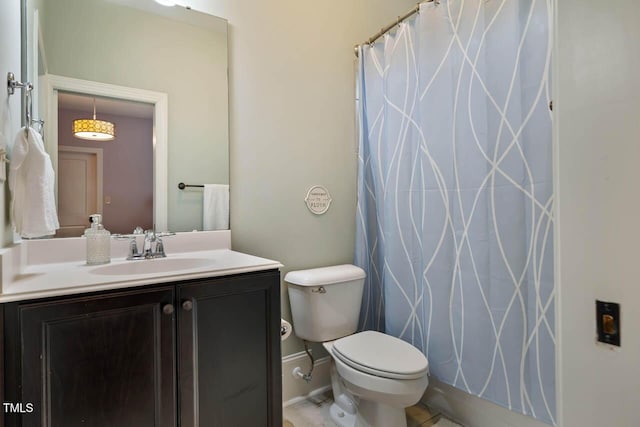 201 Margaret Mann Way, Pittsboro, NC 27312 - full bath featuring vanity, toilet, curtained shower, and baseboards