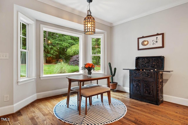 201 Margaret Mann Way, Pittsboro, NC 27312 - dining area featuring baseboards, ornamental molding, wood finished floors, a desk, and a chandelier