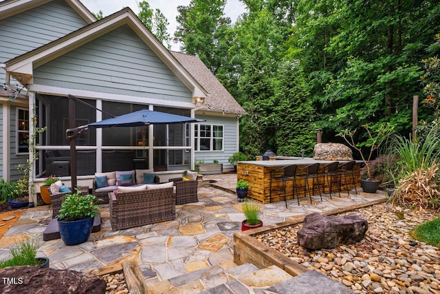 201 Margaret Mann Way, Pittsboro, NC 27312 - view of patio with outdoor lounge area and a sunroom