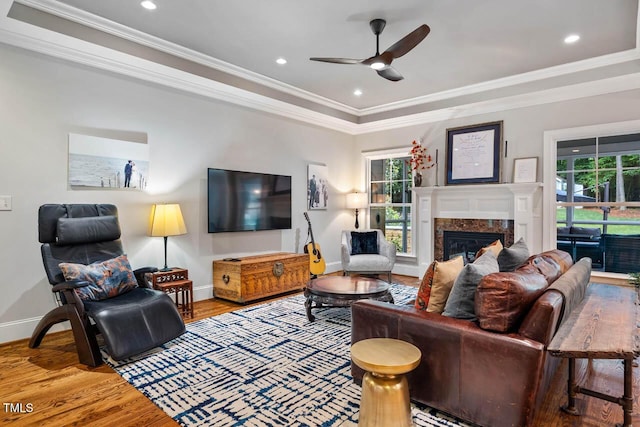 201 Margaret Mann Way, Pittsboro, NC 27312 - living area with baseboards, plenty of natural light, a ceiling fan, wood finished floors, and ornamental molding