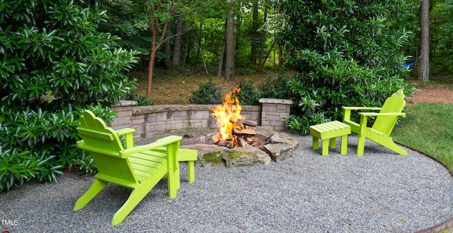 201 Margaret Mann Way, Pittsboro, NC 27312 - view of patio featuring a fire pit