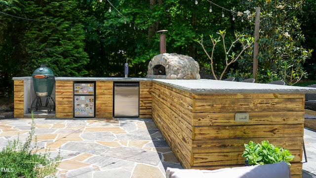 201 Margaret Mann Way, Pittsboro, NC 27312 - view of patio featuring exterior kitchen