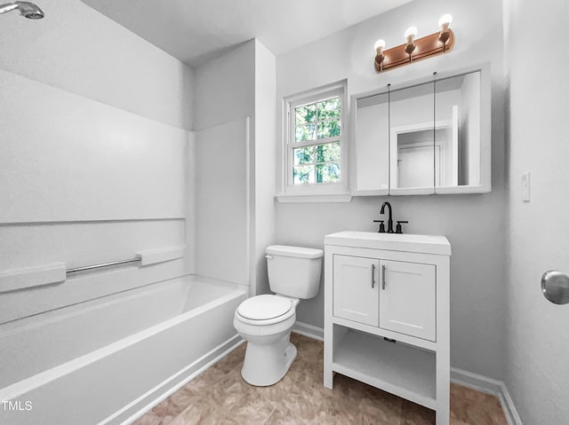 2705 Ramblegate Ln, Durham, NC 27705 - full bathroom with vanity, toilet, baseboards, and washtub / shower combination
