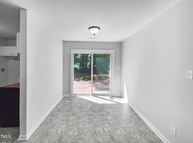 2705 Ramblegate Ln, Durham, NC 27705 - empty room featuring baseboards
