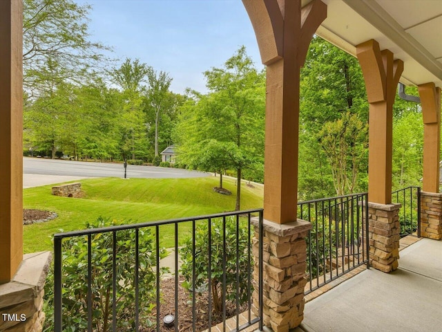 374 Crimson Way, Pittsboro, NC 27312 - covered porch featuring a lawn