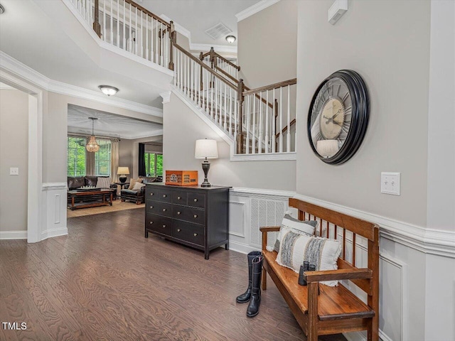 374 Crimson Way, Pittsboro, NC 27312 - stairs with wood finished floors, ornamental molding, and a wainscoted wall