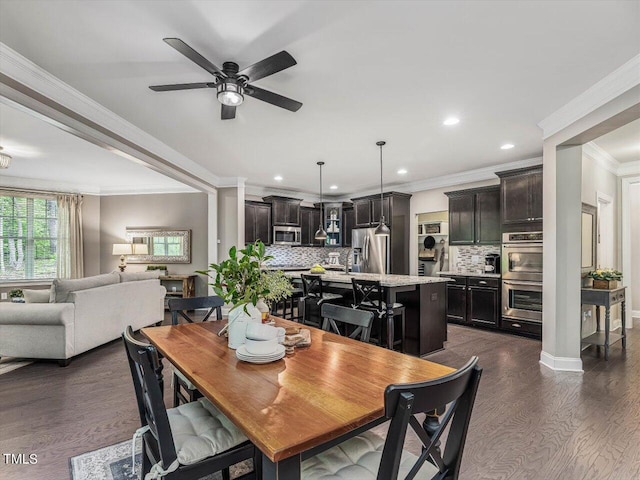 374 Crimson Way, Pittsboro, NC 27312 - dining room featuring ceiling fan, crown molding, recessed lighting, dark wood finished floors, and baseboards