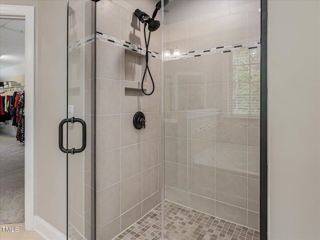 374 Crimson Way, Pittsboro, NC 27312 - bathroom with a stall shower and a walk in closet