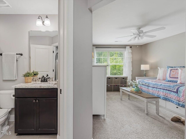 374 Crimson Way, Pittsboro, NC 27312 - bedroom featuring carpet floors, a sink, and a ceiling fan