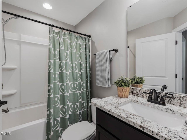 374 Crimson Way, Pittsboro, NC 27312 - bathroom featuring vanity, shower / bathtub combination with curtain, and toilet