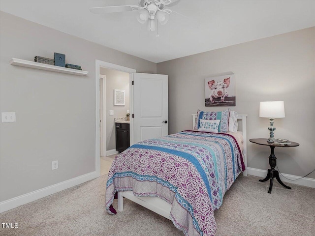 374 Crimson Way, Pittsboro, NC 27312 - bedroom featuring light colored carpet, baseboards, a ceiling fan, and ensuite bath