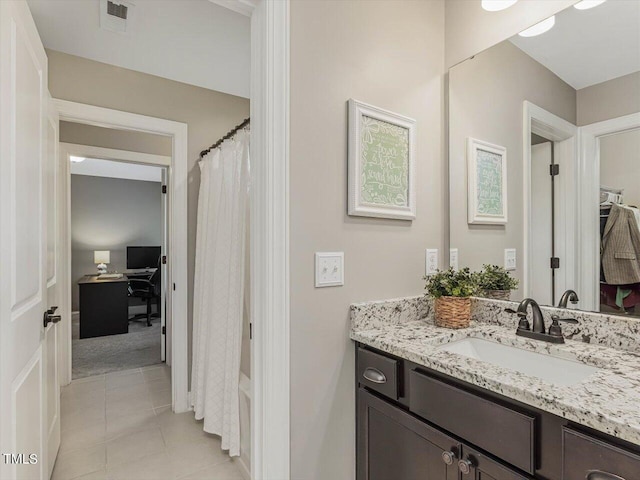 374 Crimson Way, Pittsboro, NC 27312 - full bath featuring vanity, tile patterned flooring, and shower / tub combo
