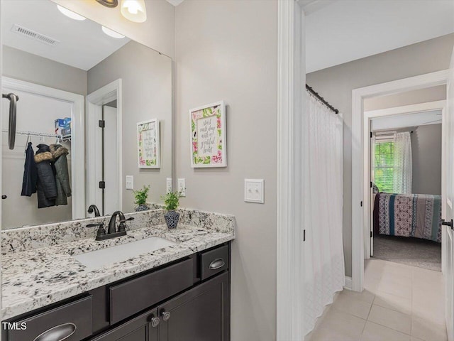 374 Crimson Way, Pittsboro, NC 27312 - bathroom featuring vanity and tile patterned flooring