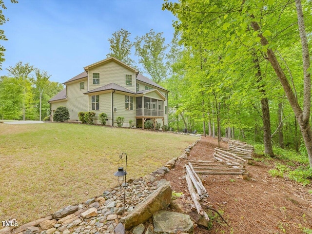 374 Crimson Way, Pittsboro, NC 27312 - view of front of home with a sunroom and a front lawn