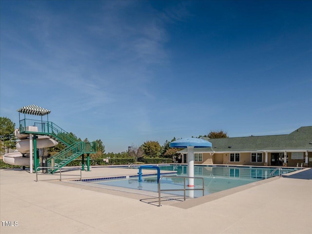 374 Crimson Way, Pittsboro, NC 27312 - community pool featuring a patio area