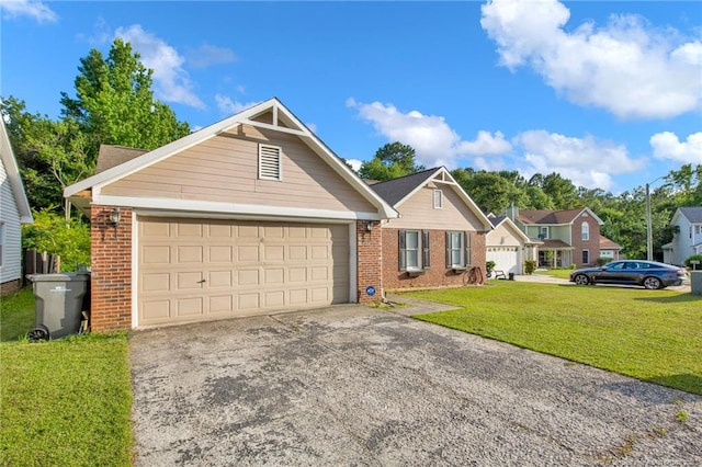 5921 Bloomsbury Dr, Fayetteville, NC 28306 - single story home with brick siding, concrete driveway, a front lawn, and an attached garage