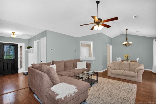 5921 Bloomsbury Dr, Fayetteville, NC 28306 - living area featuring wood finished floors, vaulted ceiling, a chandelier, a ceiling fan, and baseboards