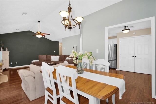 5921 Bloomsbury Dr, Fayetteville, NC 28306 - dining space featuring ceiling fan, lofted ceiling, wood finished floors, a chandelier, and baseboards