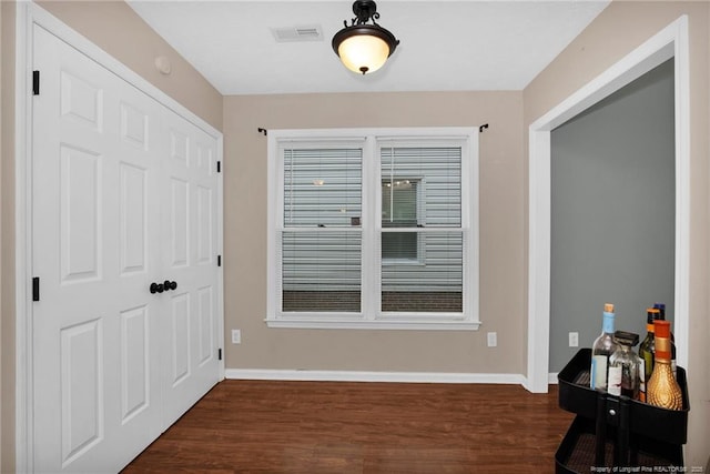 5921 Bloomsbury Dr, Fayetteville, NC 28306 - entryway with dark wood-type flooring and baseboards