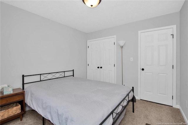 5921 Bloomsbury Dr, Fayetteville, NC 28306 - carpeted bedroom featuring a closet and baseboards