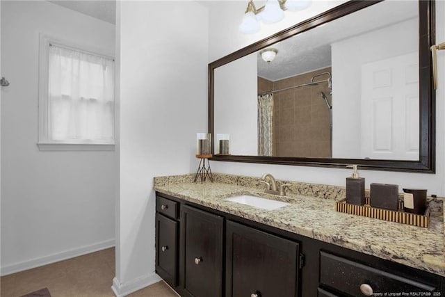 5921 Bloomsbury Dr, Fayetteville, NC 28306 - bathroom featuring vanity, curtained shower, and baseboards