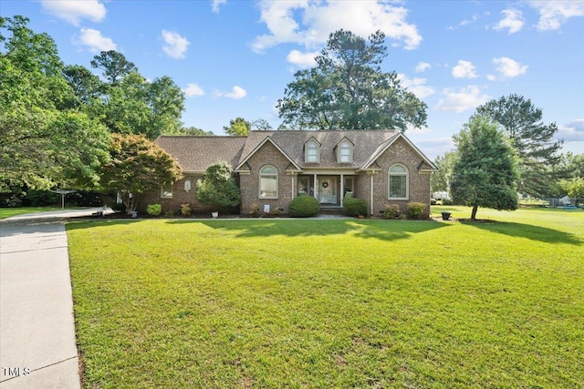 5924 Finish Line Dr, Hope Mills, NC 28348 - view of front facade featuring a front lawn and brick siding