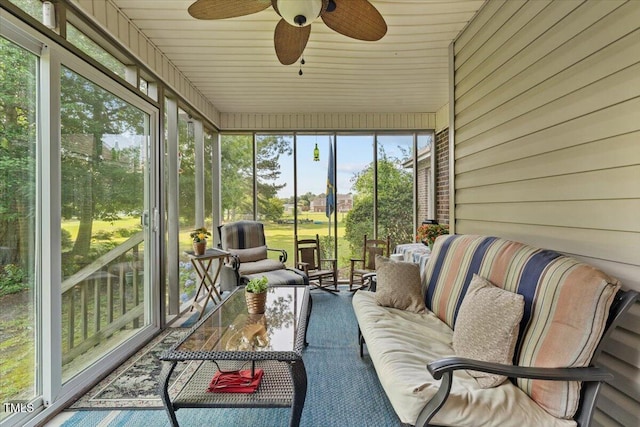 5924 Finish Line Dr, Hope Mills, NC 28348 - sunroom featuring a ceiling fan and an outdoor living space