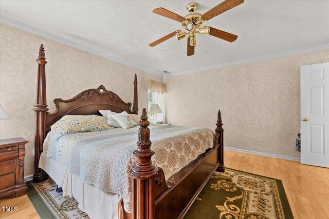 5924 Finish Line Dr, Hope Mills, NC 28348 - bedroom with light wood-style flooring, crown molding, and a ceiling fan