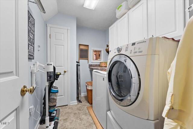 5924 Finish Line Dr, Hope Mills, NC 28348 - laundry room with cabinet space, washer / clothes dryer, light carpet, a textured ceiling, and baseboards