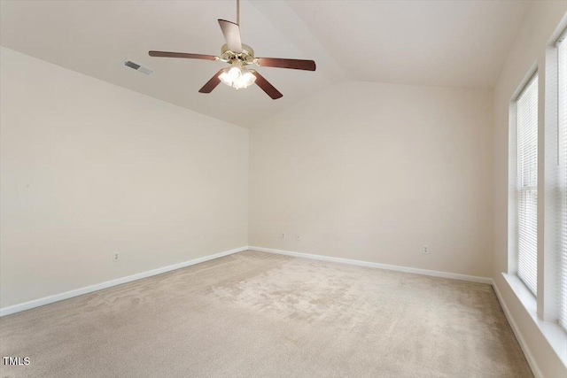402 Halls Mill Dr, Cary, NC 27519 - empty room featuring vaulted ceiling, a ceiling fan, light carpet, and baseboards