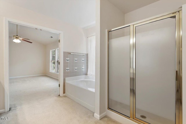 402 Halls Mill Dr, Cary, NC 27519 - bathroom with a bath, a stall shower, lofted ceiling, a ceiling fan, and baseboards