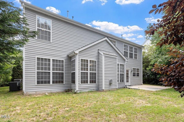 402 Halls Mill Dr, Cary, NC 27519 - back of house with a patio area, central air condition unit, and a yard