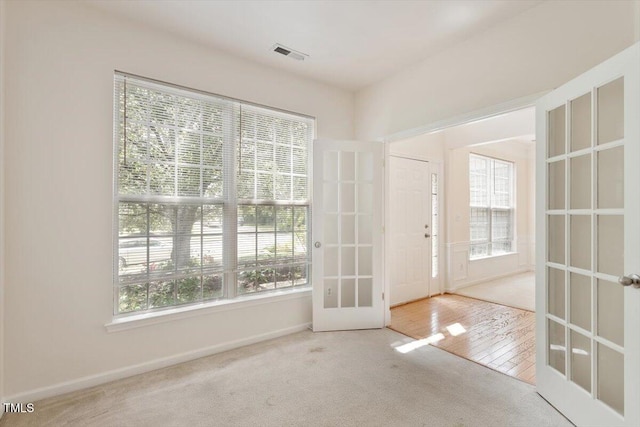 402 Halls Mill Dr, Cary, NC 27519 - doorway to outside with carpet floors, french doors, and baseboards