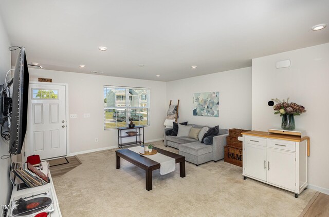 8840 Shallow Creek Trl, Bailey, NC 27807 - living area featuring light carpet, baseboards, and recessed lighting