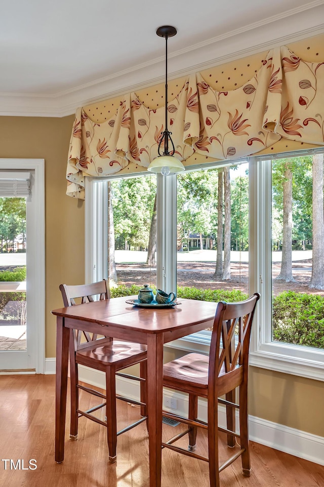 84307 Winslow, Chapel Hill, NC 27517 - dining room with crown molding and light wood-style floors
