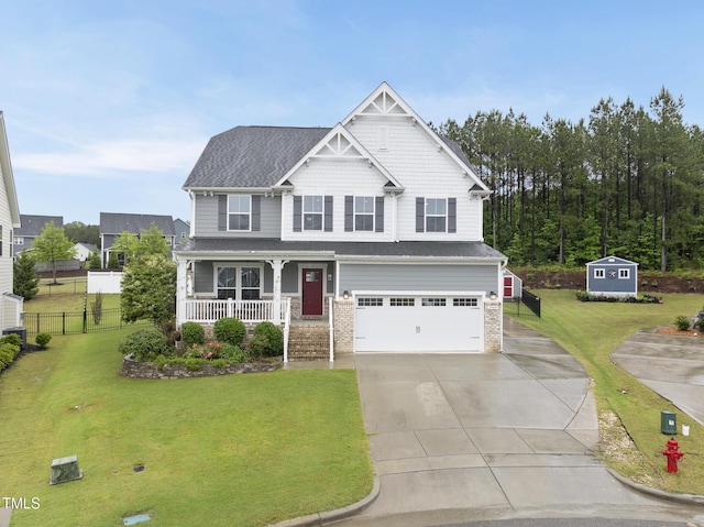 2909 Landon Pines Ct, New Hill, NC 27562 - craftsman inspired home featuring covered porch, an attached garage, driveway, and a shingled roof