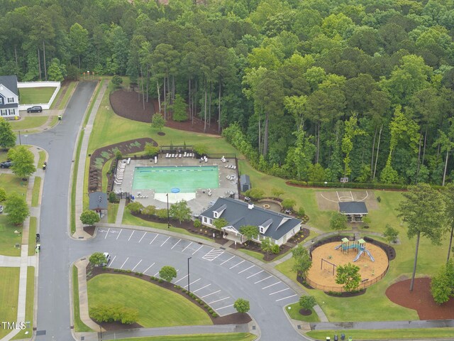 2909 Landon Pines Ct, New Hill, NC 27562 - aerial view of a pool area and a forest