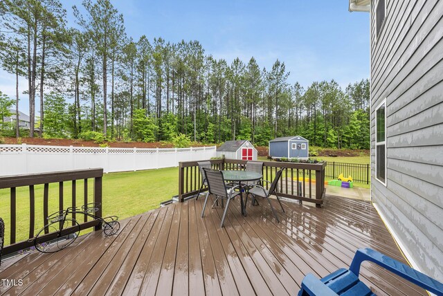 2909 Landon Pines Ct, New Hill, NC 27562 - wooden deck featuring outdoor dining area