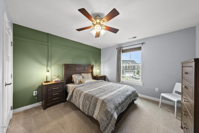 2909 Landon Pines Ct, New Hill, NC 27562 - bedroom featuring light carpet, baseboards, and ceiling fan