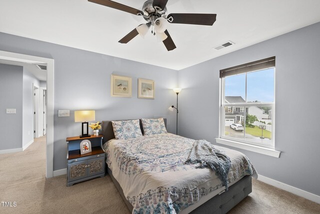 2909 Landon Pines Ct, New Hill, NC 27562 - carpeted bedroom featuring baseboards and ceiling fan