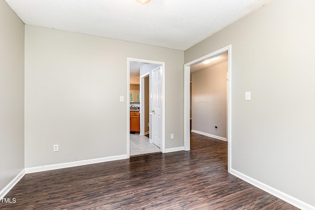 5008 Dantonville Ct, Knightdale, NC 27545 - spare room featuring wood finished floors and baseboards