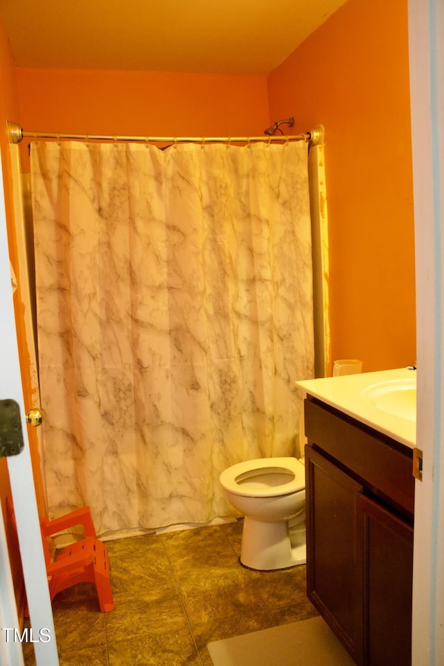 764 Grove Creek Ln, Raleigh, NC 27610 - bathroom with vanity, toilet, and a shower with curtain