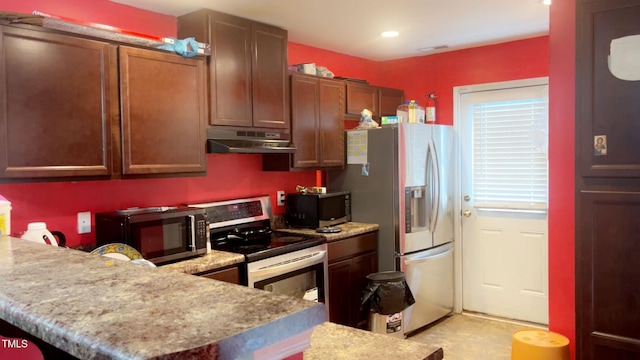764 Grove Creek Ln, Raleigh, NC 27610 - kitchen featuring under cabinet range hood, stainless steel appliances, a peninsula, and recessed lighting