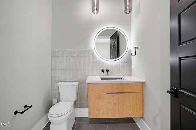 5406 Garrett Rd, Durham, NC 27707 - half bath with vanity and tile patterned floors