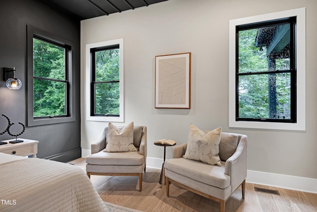 5406 Garrett Rd, Durham, NC 27707 - bedroom with baseboards and light wood finished floors